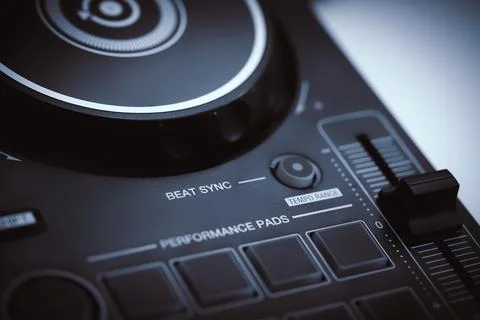 Beat Sync button on a Digital DJ controller  closed up Stock Photos