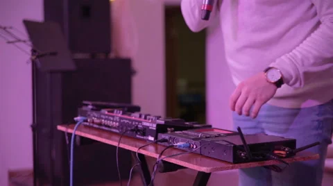 Beatboxer adjusts loop station Stock Footage 61794163