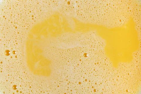 Beaten eggs background Stock Photos