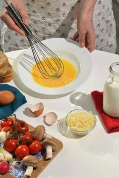 Beaten Eggs to Prepare An Omelette Stock Photos