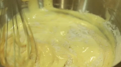 Beaten flour with eggs. Close up. Stock Footage 52357433