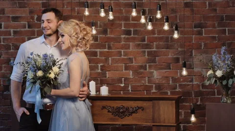 Beatiful bride and groom in the stylish interior. Serenity Stock Footage 61938540