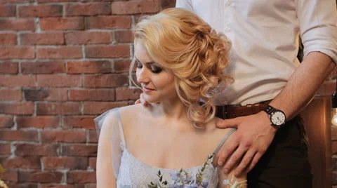 Beatiful bride and groom in the stylish interior. Serenity Stock Footage 61966322