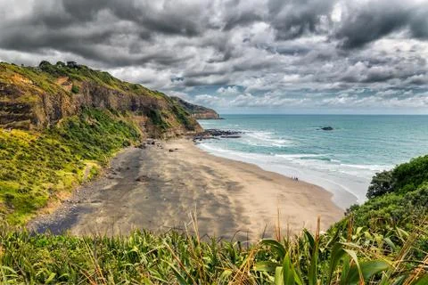 Beatiful empty black sand beach at Maori bay near Muriwai beach, North Island Stock Photos