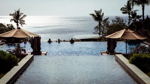 A beatiful infinity pool at a tropical destination Stock Photos
