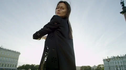 Beatiful model posing, touching her hair and smiling Stock Footage 69002540