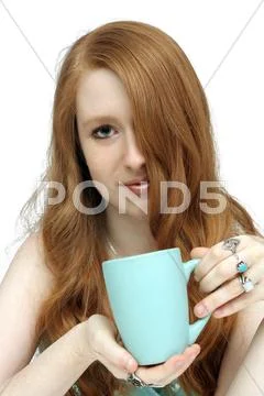 Beatiful redhead with coffee mug (2) Stock Photos
