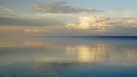 Beatiful sky and clouds timelapse over Khuvsgul lake in Mongolia Stock Footage 124997635