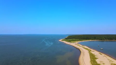On a beatiful summer day with blue sky and no clouds we have this aerial view, Stock Footage 134579094