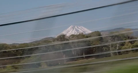 Beatiful view on Mount Fuji from Shinkansen bullet train window. A picturesque Video stock 123825237