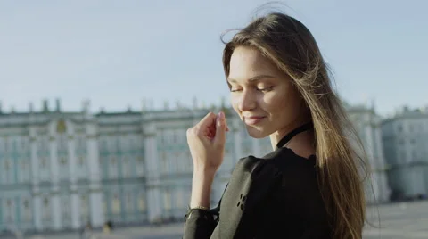 Beatiful young woman posing at beatiful view Stock Footage 69001657