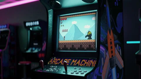 Beating the alien monster in the classic leisure arcade console game challenge Stock Footage 248543827