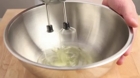 Beating egg white stiffly Stock-Footage 24662530