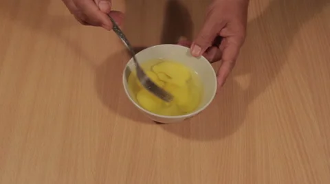 Beating Eggs in a Bowl Stock Footage 68494264