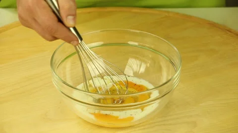 Beating eggs with milk Stock Footage 47981164