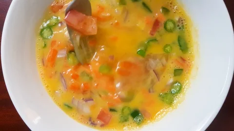 Beating eggs for Omelette Stock Footage 124051372