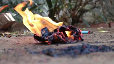 Beating fire with a shoe 2 Video stock 153657242
