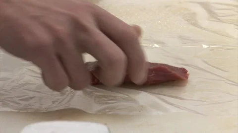 Beating the meat Stock Footage 3990384