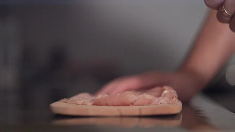 Beating meat with a mallet Stock Footage 86465719