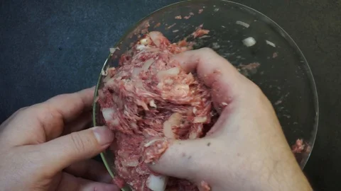 Beating minced meat overhead Stock Footage 103984683