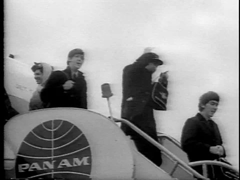 Beatles arrive in America for first time Febraury 7 1964 Stock Footage 80743593