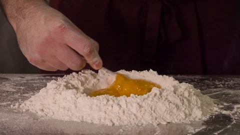 Beats egg in flour Video stock 107891671