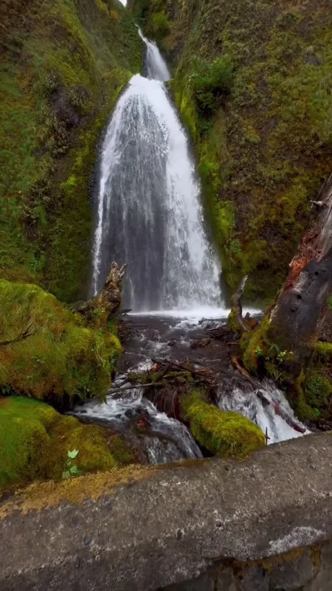 Beatuiful waterfall between the mountains Stock Footage 274111146