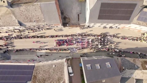 Beaumont Carnival Procession Marching Along Wide Street Flanked By Dense Crowd Stock Footage 335309254
