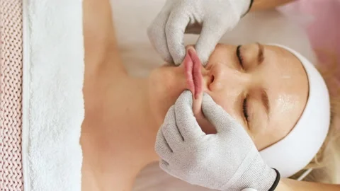 Beautician makes procedure on lips with microcurrent Stock Footage 221261258