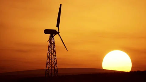 Beautiful 3D animation of a lonely wind turbine in a field with a beautiful Stock Footage 155884038
