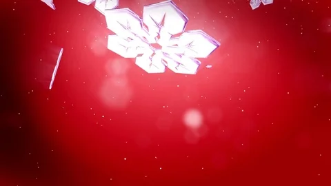 Beautiful 3d snowflakes float in air and shine at night on a red background. Use Stock Footage 82867633