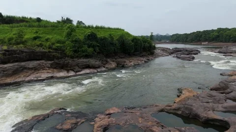 Beautiful 4k aerial drone view of river water flowing in forest Stock Footage 285387123