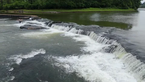 Beautiful 4k aerial drone view of river water flowing in forest Video stock 285387255