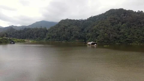 Beautiful 4K Handheld view moving from right to left of Ringlet Lake Stock Footage 246871110