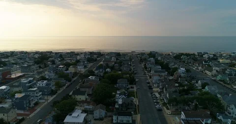 Beautiful 4K slow motion aerial of the town of Beach Haven, New Jersey, flying Stock Footage 90971908
