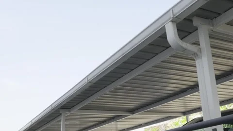 Beautiful 4k Video of a side to side Pan of a beautifully built Shade carport wi Stock Footage 250481699