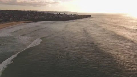 Beautiful 59 second drone footage flies forward over Maroubra Beach at sunrise Stock Footage 334130773