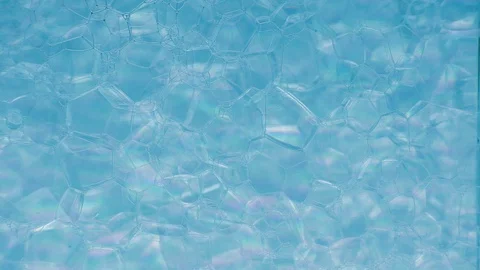 Beautiful abstract bubbly pattern with dye flowing through Stock Footage 127867878