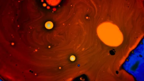 Beautiful abstract liquid art pattern with blue and yellow dye Stock Footage 127714490