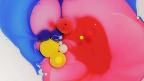 Beautiful abstract paint drops mixed with milk oil and soap Stock Footage 134704714