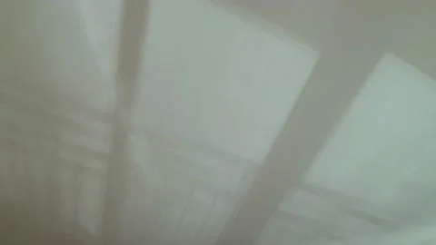 Beautiful abstract shadows on the ceiling and walls. Trembling shadows of the Stock Footage 154820794