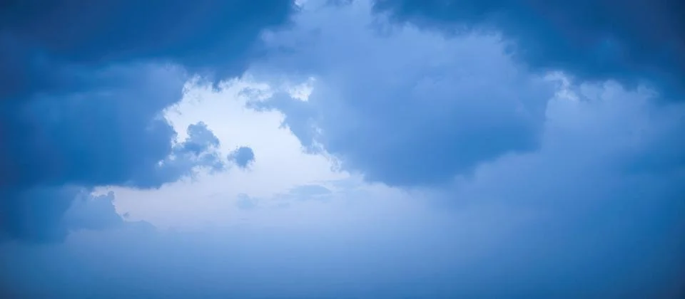 Beautiful abstract view of opening in dramatic cloudscape, moody and cinemati 스톡 일러스트