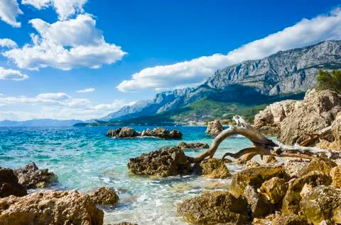 Beautiful Adriatic Sea and mountains in background on warm sunny day Stock Photos