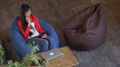 Beautiful adult female has phone conversation use wifi Stock Footage