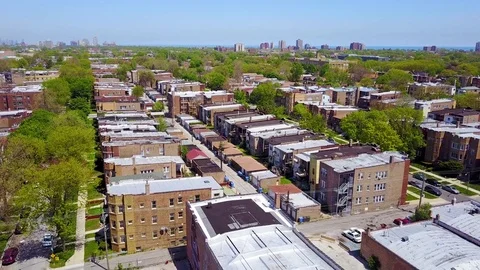 Beautiful aerial around a Moorish dome and lower class neighborhoods on the Stock Footage
