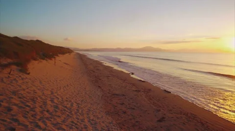 Beautiful aerial drone footage of beach during sunset Stock Footage 59077415