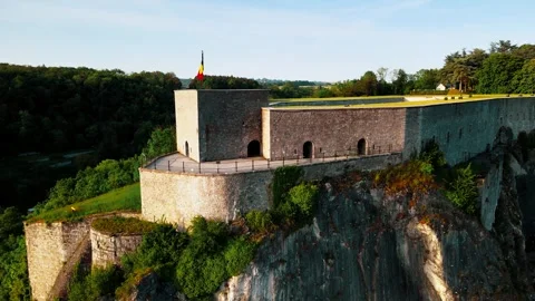 Beautiful aerial drone of the historic castle of Dinant with the Belgium flag 4k Stock Footage 242501422