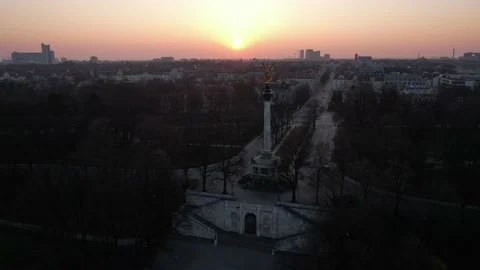 Beautiful aerial footage of a sunrise by Friedensengel in Munich, Germany Stock Footage