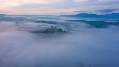 Beautiful aerial hyperlapse of sunset in the mountains Stock Footage