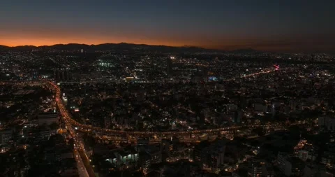 Beautiful aerial hyperlapse view of modern urban Mexico City, at night Stock Footage 236686836